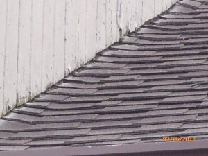 Wood siding to roofing contact