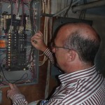 home inspector in electric panel